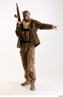 Andrew Elliott Insurgent Pointing holding gun standing whole body 0001.jpg